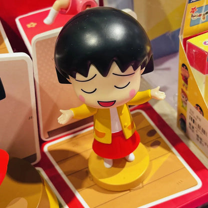 Helpless Head Shake Chibi Maruko-chan wind-up figure close-up on display stand