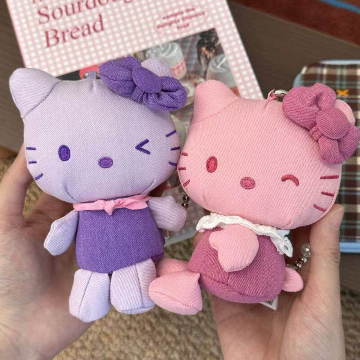 Hello Kitty denim series plush pendants in light purple and pink with bow charms