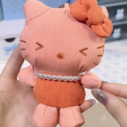 Hello Kitty denim series plush charm in orange corduroy with orange bow