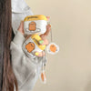 Japanese Cartoon Gudetama Sit on Egg White Yellow with Keychain - AirPods AirPodsPro AirPods3 AirPods4 Case