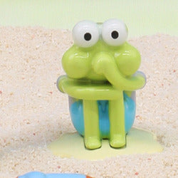 Life of Fish Series - Jimmy green fish alloy figure sitting on a rock