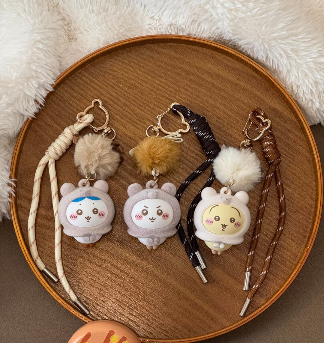 [Pre-order] ChiiKawa X Miniso Fluffy Bear Series | ChiiKawa Hachiware Usagi Wearing Fluffy Bear Cloak Plastic Doll with Wool Ball Keychain - Kawaii Items Room Decoration