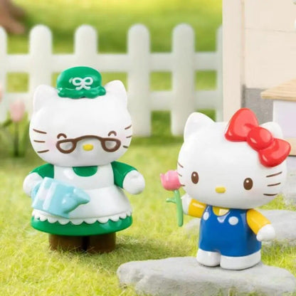 Hello Kitty Little Family Series Watering Flowers mini figure pair - opened box, sealed bag