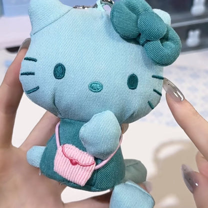 Hello Kitty denim series plush charm in mint blue corduroy with green bow and pink bag